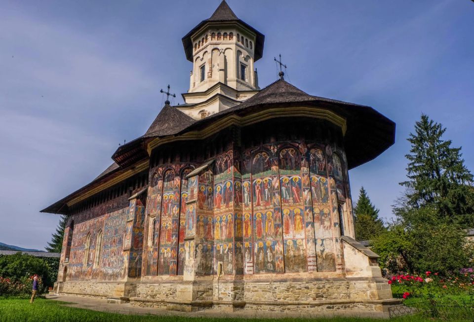 The fresco-covered exterior of a painted monastery in Bucovina